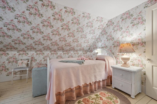 62 Blackswoods Rd, Franklin, ME 04634 - bedroom with wallpapered walls and hardwood / wood-style flooring