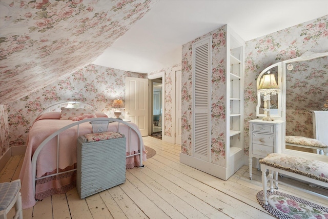 62 Blackswoods Rd, Franklin, ME 04634 - bedroom featuring wallpapered walls, hardwood / wood-style floors, and a closet