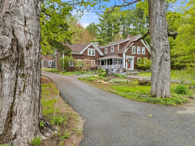 62 Blackswoods Rd, Franklin, ME 04634 - shingle-style home featuring a chimney and asphalt driveway