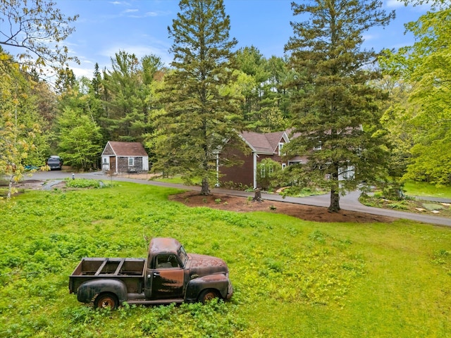 62 Blackswoods Rd, Franklin, ME 04634 - view of grassy yard featuring an outdoor structure
