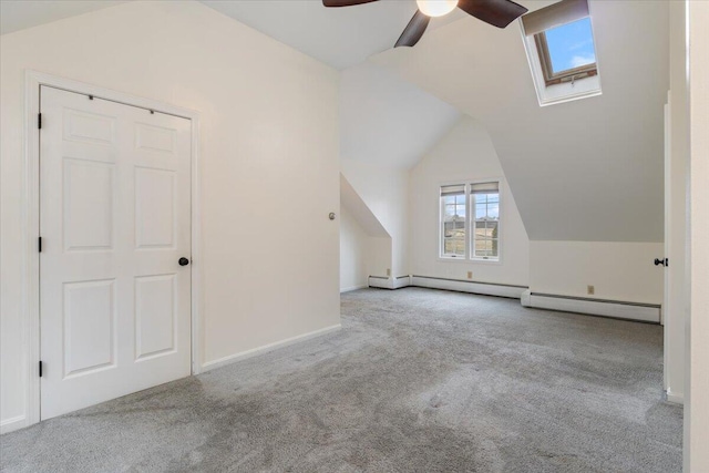 4 Buttonwood Rd, South Berwick, ME 03908 - bonus room with carpet flooring, ceiling fan, vaulted ceiling, a baseboard heating unit, and a skylight
