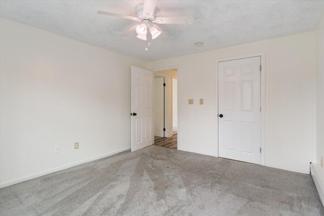 4 Buttonwood Rd, South Berwick, ME 03908 - spare room featuring carpet, ceiling fan, a textured ceiling, and baseboard heating