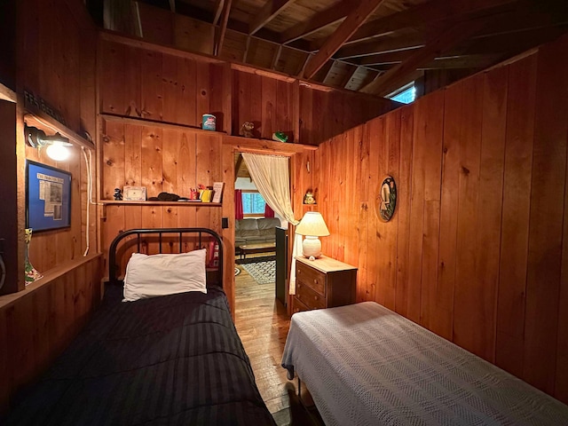 63 Naples Rd, Harrison, ME 04040 - bedroom featuring wood walls and hardwood / wood-style flooring