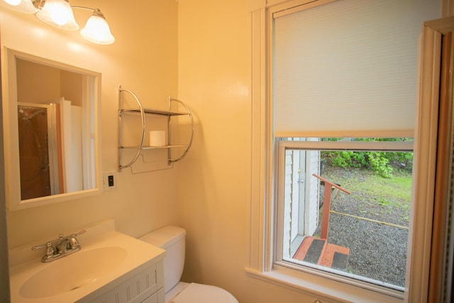 28 Pier St, Bangor, ME 04401 - bathroom with toilet and vanity