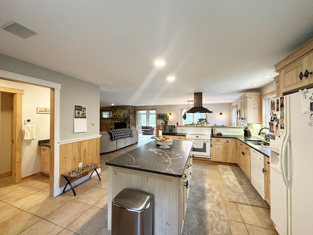 7 Ponderosa Ln, Biddeford, ME 04005 - kitchen with white appliances, island range hood, light brown cabinets, a peninsula, and light tile patterned floors