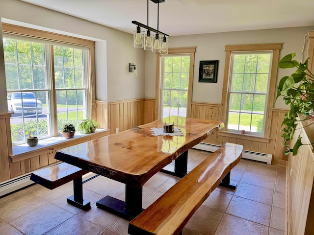 7 Ponderosa Ln, Biddeford, ME 04005 - tiled dining area featuring a wainscoted wall and a baseboard heating unit
