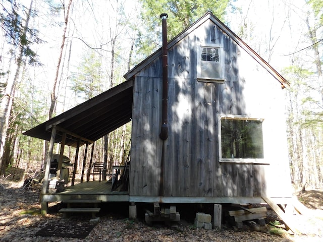 157 Bradley Ln, Mercer, ME 04957 - view of side of property featuring a wooden deck