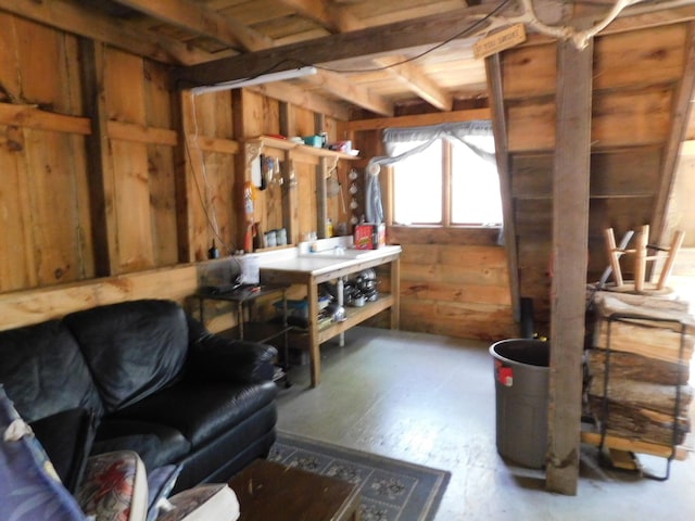 157 Bradley Ln, Mercer, ME 04957 - below grade area featuring wood walls and a workshop area