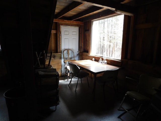 157 Bradley Ln, Mercer, ME 04957 - dining room featuring wood walls
