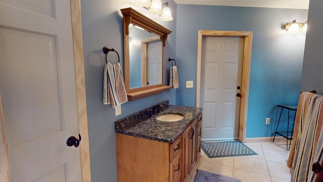 129 Maple Shore Ln, Stetson, ME 04488 - bathroom featuring vanity, baseboards, and tile patterned floors
