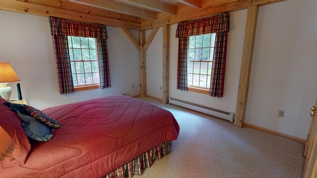 129 Maple Shore Ln, Stetson, ME 04488 - bedroom featuring a baseboard radiator, multiple windows, carpet floors, beam ceiling, and baseboards