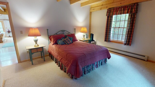 129 Maple Shore Ln, Stetson, ME 04488 - carpeted bedroom featuring a baseboard radiator, multiple windows, beamed ceiling, and baseboards