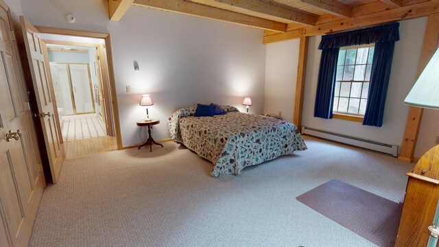 129 Maple Shore Ln, Stetson, ME 04488 - carpeted bedroom featuring a baseboard radiator, beam ceiling, and baseboards