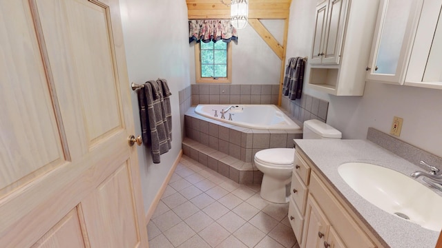 129 Maple Shore Ln, Stetson, ME 04488 - bathroom featuring a bath, tile patterned floors, vanity, and toilet