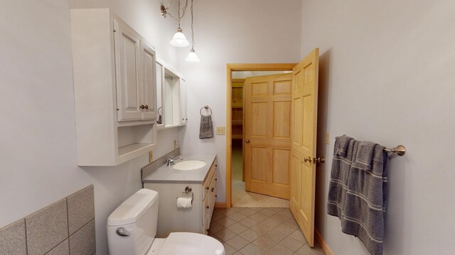 129 Maple Shore Ln, Stetson, ME 04488 - bathroom featuring toilet, tile patterned flooring, and vanity