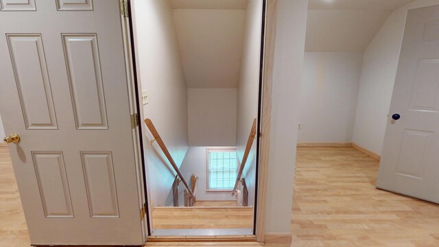 129 Maple Shore Ln, Stetson, ME 04488 - stairway with wood finished floors and vaulted ceiling