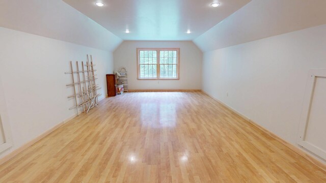 129 Maple Shore Ln, Stetson, ME 04488 - bonus room featuring light wood-type flooring, lofted ceiling, baseboards, and recessed lighting