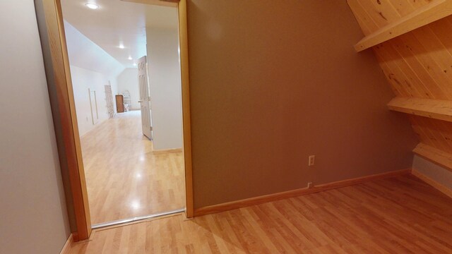 129 Maple Shore Ln, Stetson, ME 04488 - bonus room featuring light wood finished floors, lofted ceiling, and baseboards