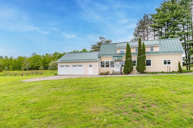 303 Williams Rd, Bradford, ME 04410 - view of front facade with a standing seam roof, dirt driveway, and a front lawn