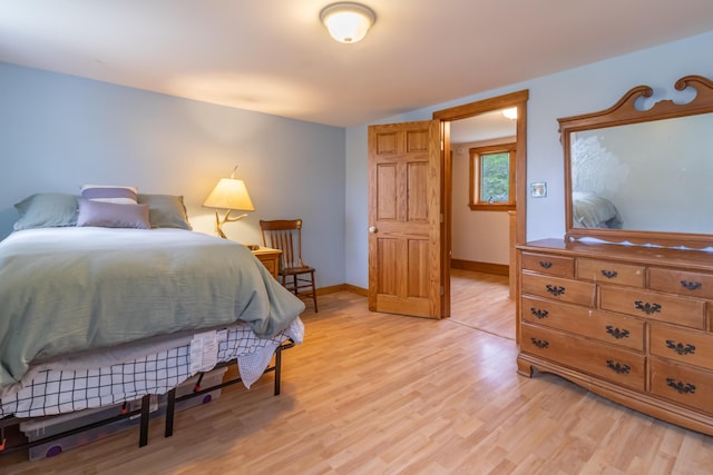303 Williams Rd, Bradford, ME 04410 - bedroom with light wood-style floors and baseboards