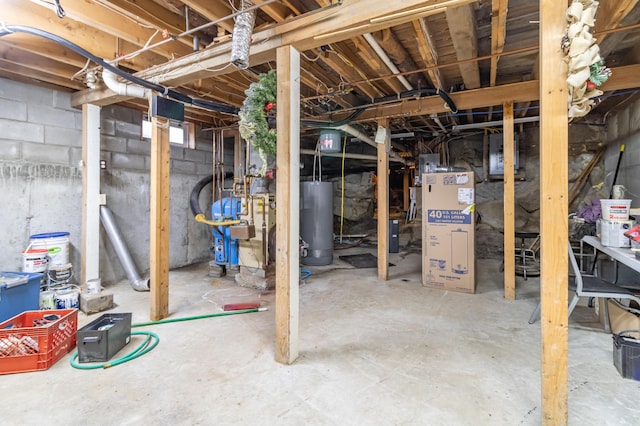 303 Williams Rd, Bradford, ME 04410 - unfinished below grade area featuring water heater