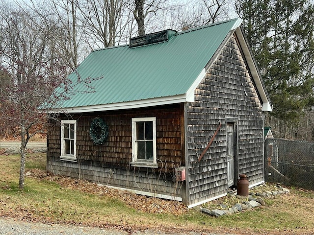 303 Williams Rd, Bradford, ME 04410 - view of side of property with a metal roof