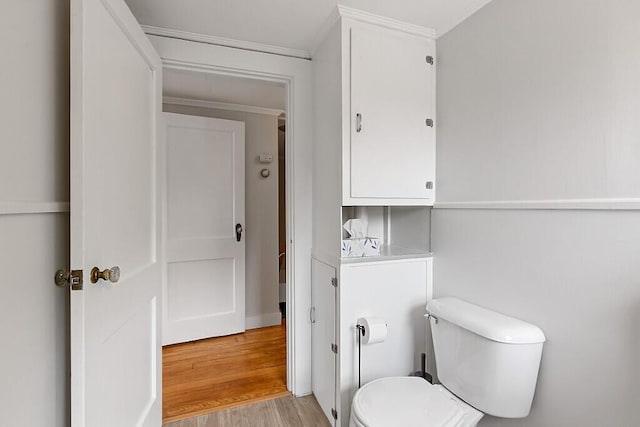 20 Donald St, Waterville, ME 04901 - bathroom with ornamental molding, toilet, and wood finished floors