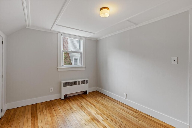 20 Donald St, Waterville, ME 04901 - bonus room featuring radiator heating unit, light wood-style floors, baseboards, and lofted ceiling