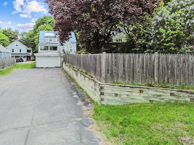 20 Donald St, Waterville, ME 04901 - view of yard with driveway and an attached garage