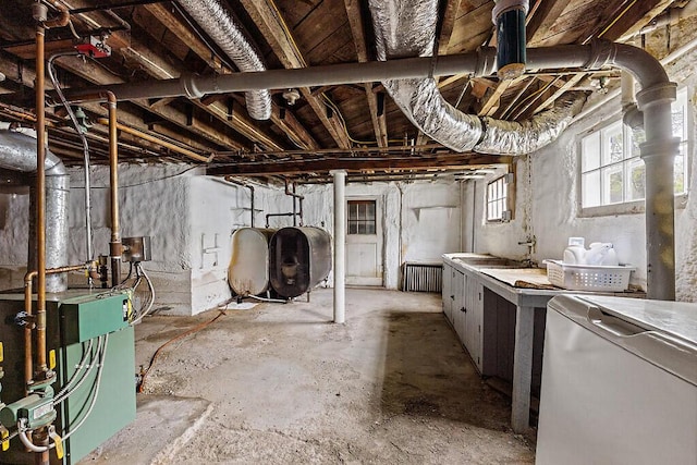 20 Donald St, Waterville, ME 04901 - below grade area with oil tank and a heating unit