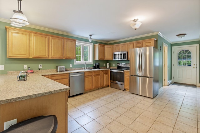15 Convene Rd, Sebago, ME 04029 - kitchen featuring appliances with stainless steel finishes, ornamental molding, light tile patterned flooring, light countertops, and a sink
