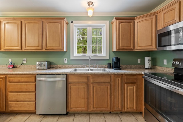 15 Convene Rd, Sebago, ME 04029 - kitchen with stainless steel appliances, a sink, crown molding, light tile patterned flooring, and light countertops