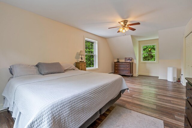 15 Convene Rd, Sebago, ME 04029 - bedroom featuring dark wood finished floors, baseboards, and ceiling fan