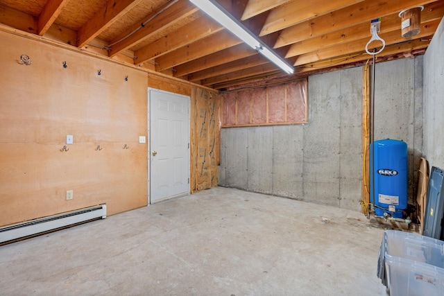 15 Convene Rd, Sebago, ME 04029 - unfinished below grade area with a water pressure tank and a baseboard heating unit