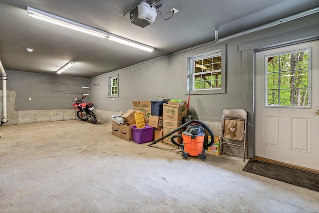 15 Convene Rd, Sebago, ME 04029 - garage featuring a garage door opener