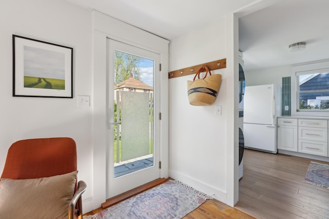 90 Wellington Rd, Portland, ME 04103 - entryway with light wood-style flooring and baseboards