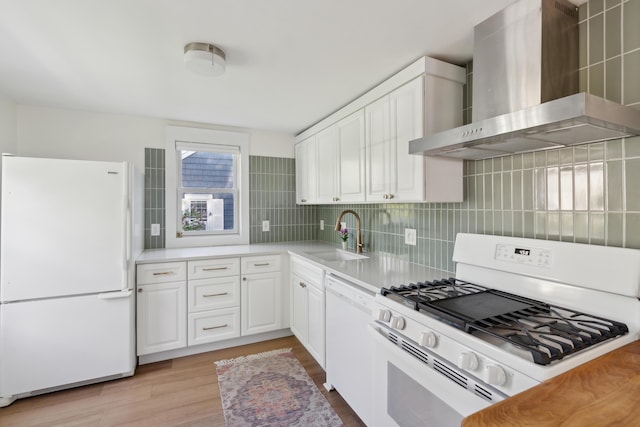 90 Wellington Rd, Portland, ME 04103 - kitchen featuring white appliances, wall chimney range hood, a sink, and backsplash
