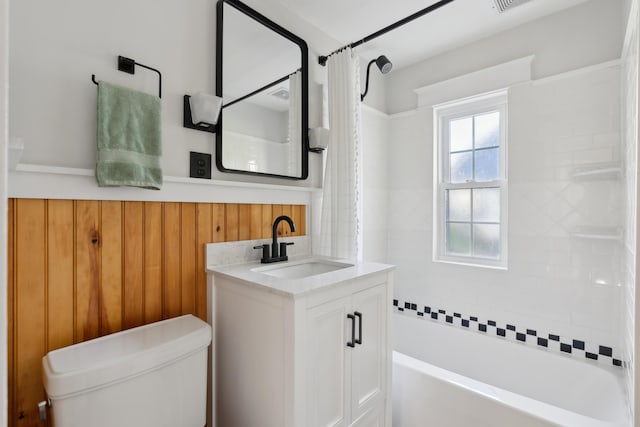 90 Wellington Rd, Portland, ME 04103 - full bath featuring shower / bath combo with shower curtain, vanity, toilet, and wood walls