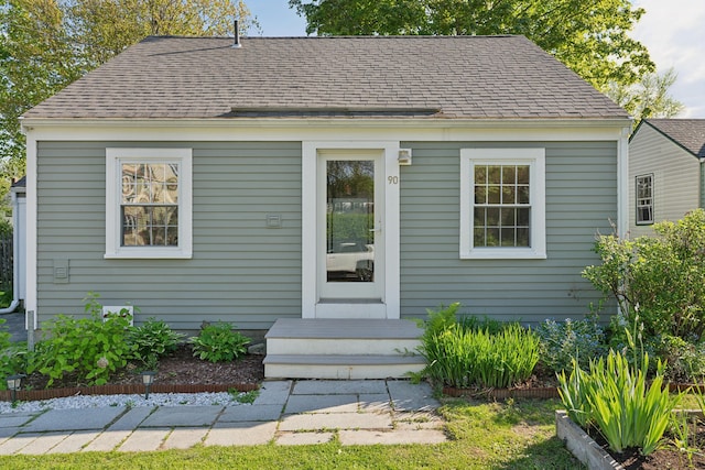 90 Wellington Rd, Portland, ME 04103 - view of front facade with a shingled roof