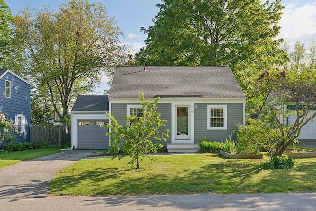 90 Wellington Rd, Portland, ME 04103 - cape cod-style house with driveway, a garage, entry steps, and a shingled roof