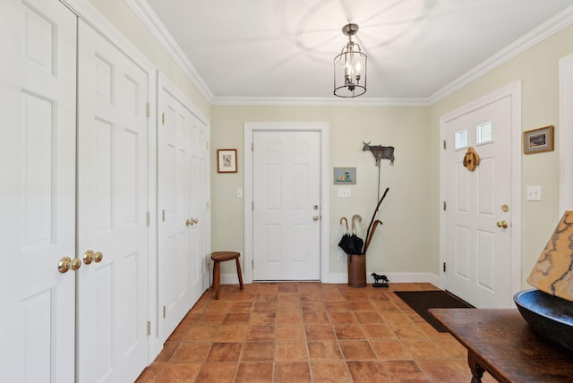 401 Princes Point Rd, Yarmouth, ME 04096 - foyer entrance featuring crown molding, a chandelier, baseboards, and stone finish floors