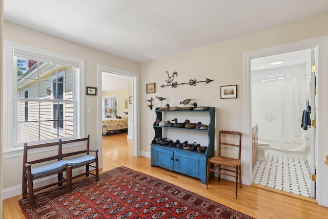 401 Princes Point Rd, Yarmouth, ME 04096 - sitting room featuring wood finished floors and baseboards