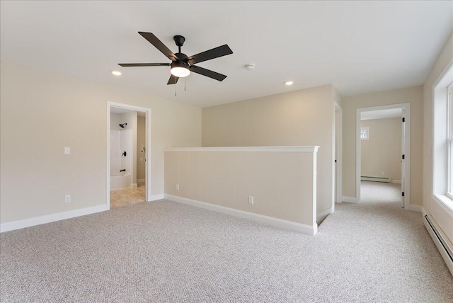 12 Casey Ln, Old Orchard Beach, ME 04064 - unfurnished room featuring baseboard heating, a ceiling fan, recessed lighting, light colored carpet, and baseboards