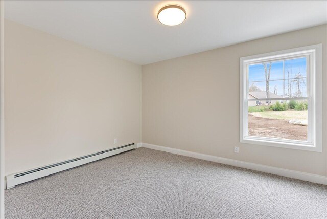 12 Casey Ln, Old Orchard Beach, ME 04064 - empty room featuring baseboard heating, carpet floors, and baseboards