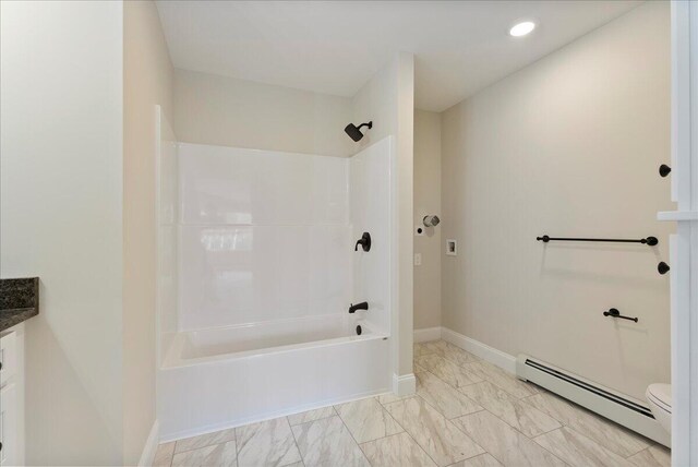 12 Casey Ln, Old Orchard Beach, ME 04064 - bathroom featuring a baseboard heating unit, toilet, shower / bathtub combination, marble finish flooring, and baseboards