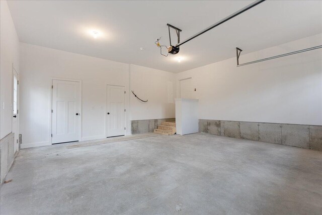 12 Casey Ln, Old Orchard Beach, ME 04064 - garage with a garage door opener