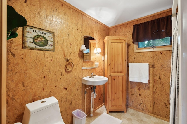 29 Island Pond Rd, Leeds, ME 04263 - half bath featuring toilet, vaulted ceiling, and a sink