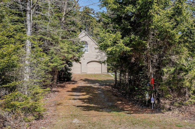 463 Martin Point Rd, Friendship, ME 04547 - view of home's exterior featuring a garage and dirt driveway