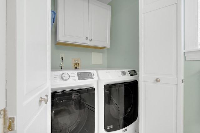 65 Pine Point Rd Unit 12, Scarborough, ME 04074 - laundry area featuring separate washer and dryer and cabinet space