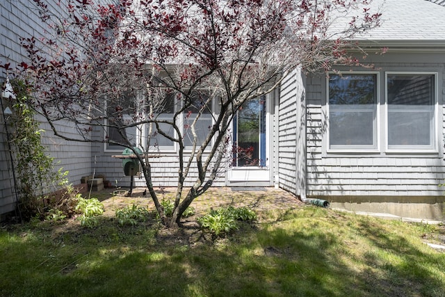 65 Pine Point Rd Unit 12, Scarborough, ME 04074 - view of home's exterior featuring a yard
